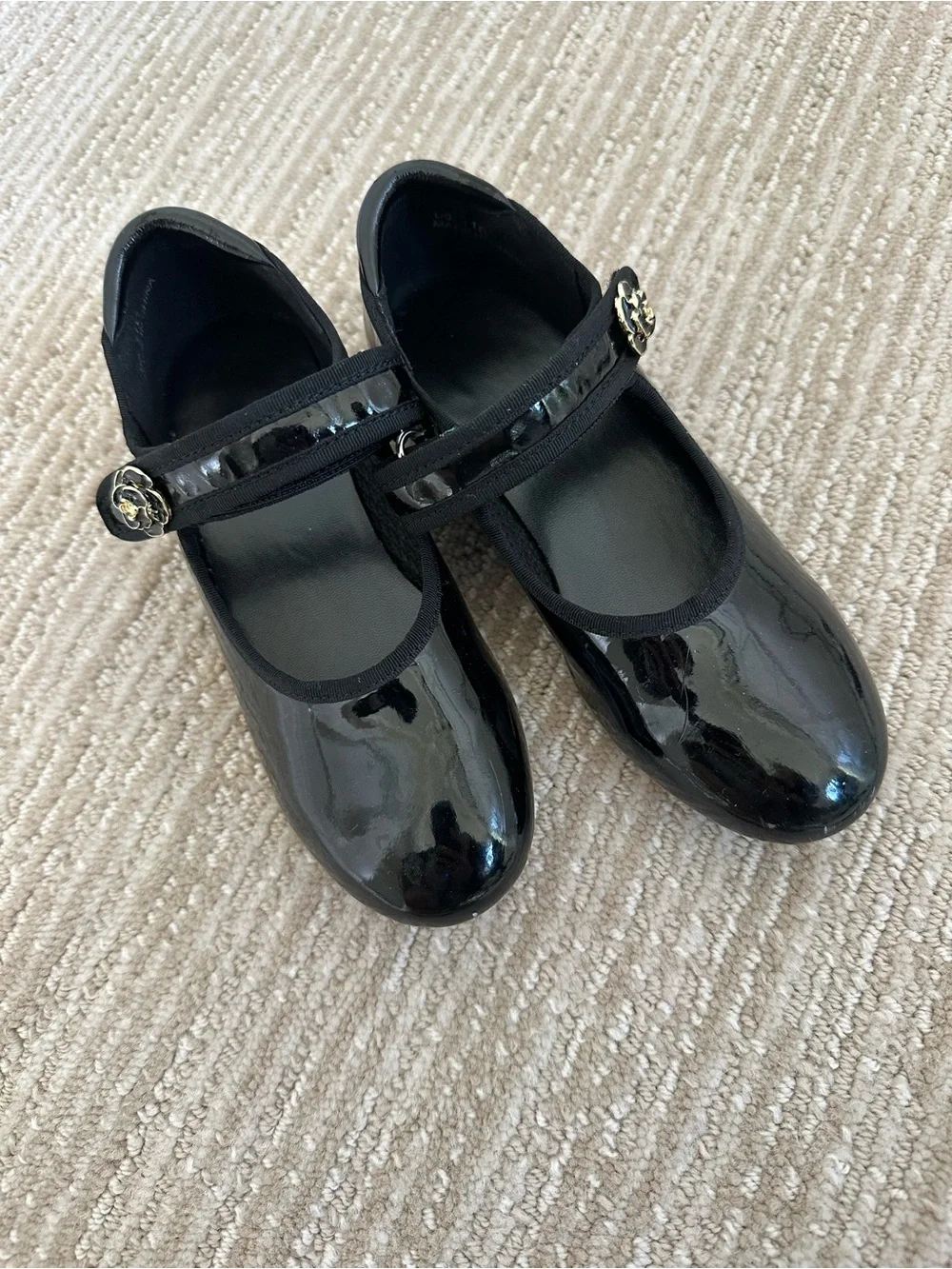Girls Black Patent Tap Dress Shoes with Floral Accent’s Strap